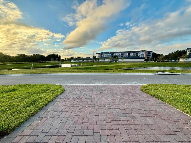 a view of an swimming pool and an outdoor seating