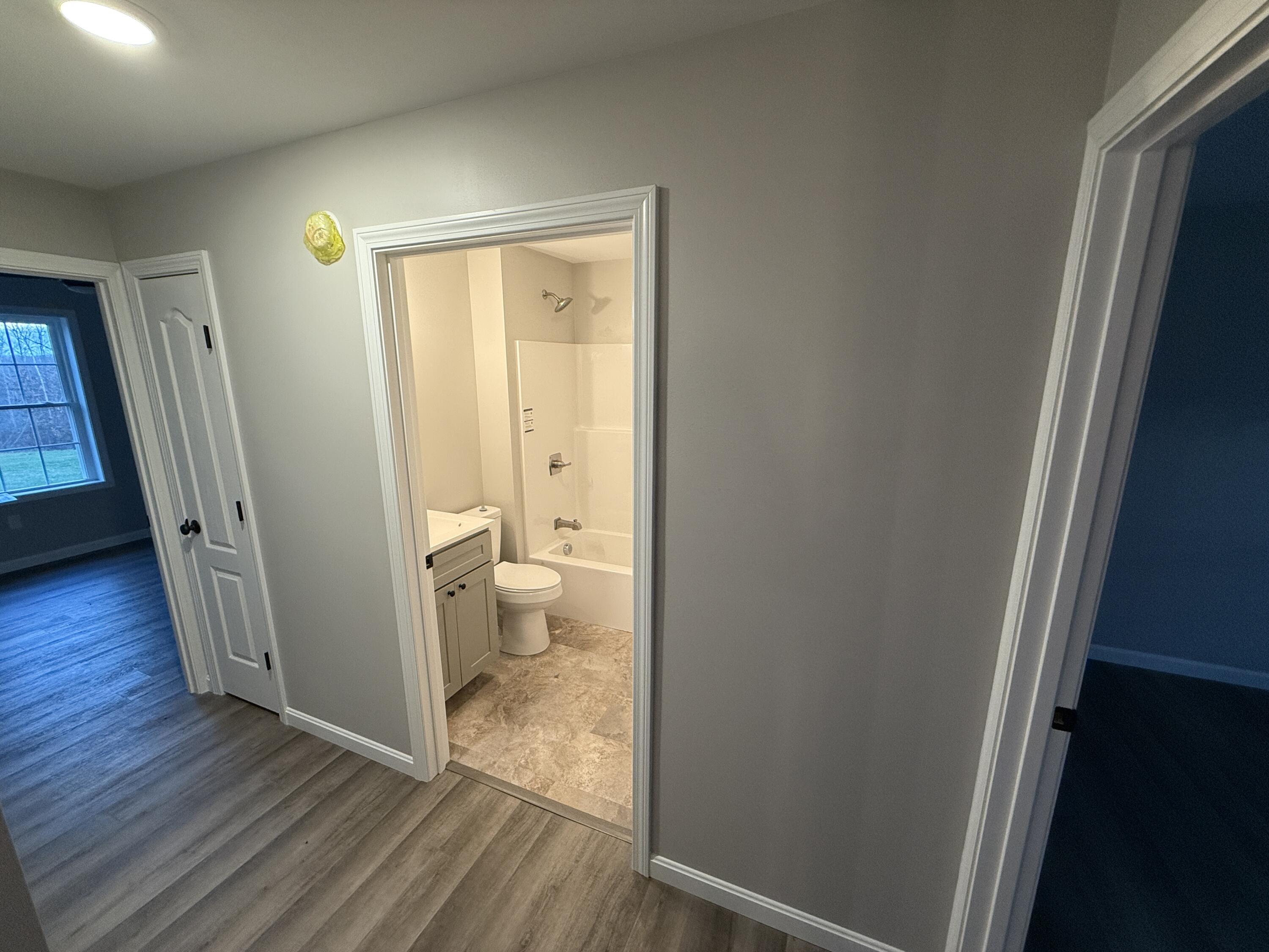 67 Deer Ridge Lane Windsor, ME 04363 - Photo 15 of 19 Hallway to spare bedrooms & bathroom