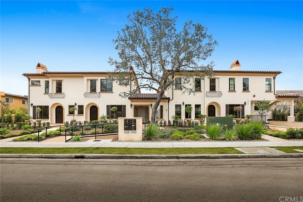 1015 Holly Avenue, Unit B Arcadia, CA 91007 - Photo 1 of 39 a front view of residential houses with yard