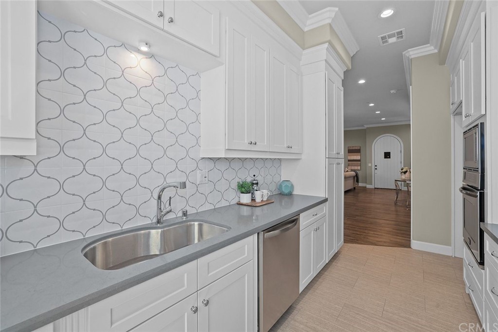 1015 Holly Avenue, Unit B Arcadia, CA 91007 - Photo 19 of 39 a kitchen with a sink and cabinets