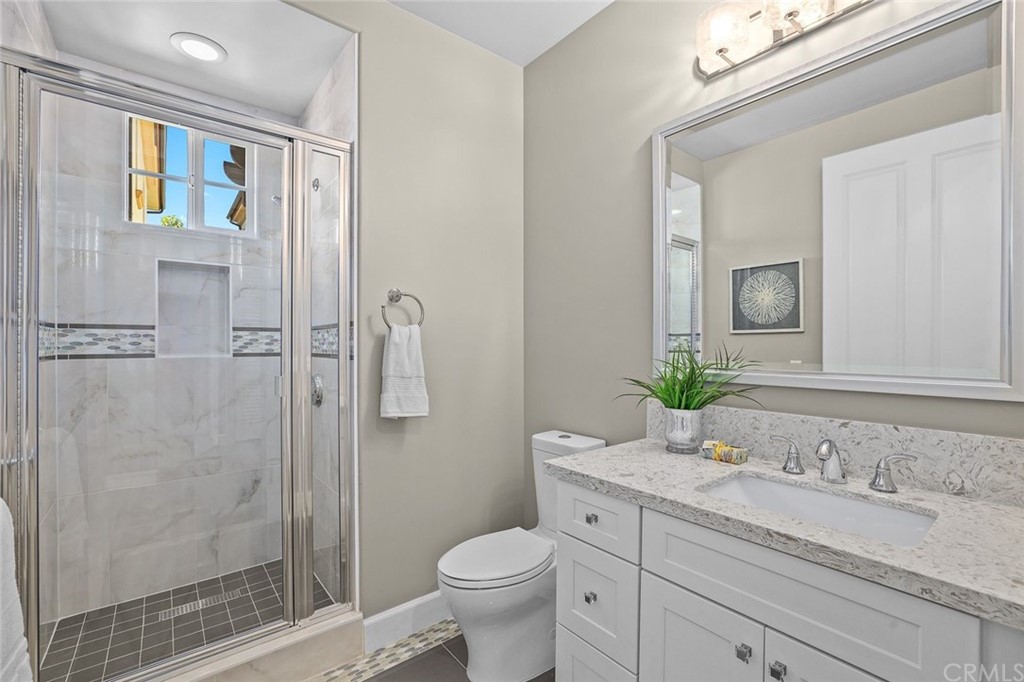 1015 Holly Avenue, Unit B Arcadia, CA 91007 - Photo 22 of 39 a bathroom with a granite countertop sink toilet and shower