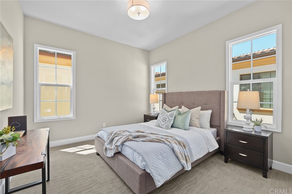 1015 Holly Avenue, Unit B Arcadia, CA 91007 - Photo 27 of 39 a bedroom with a bed and a window