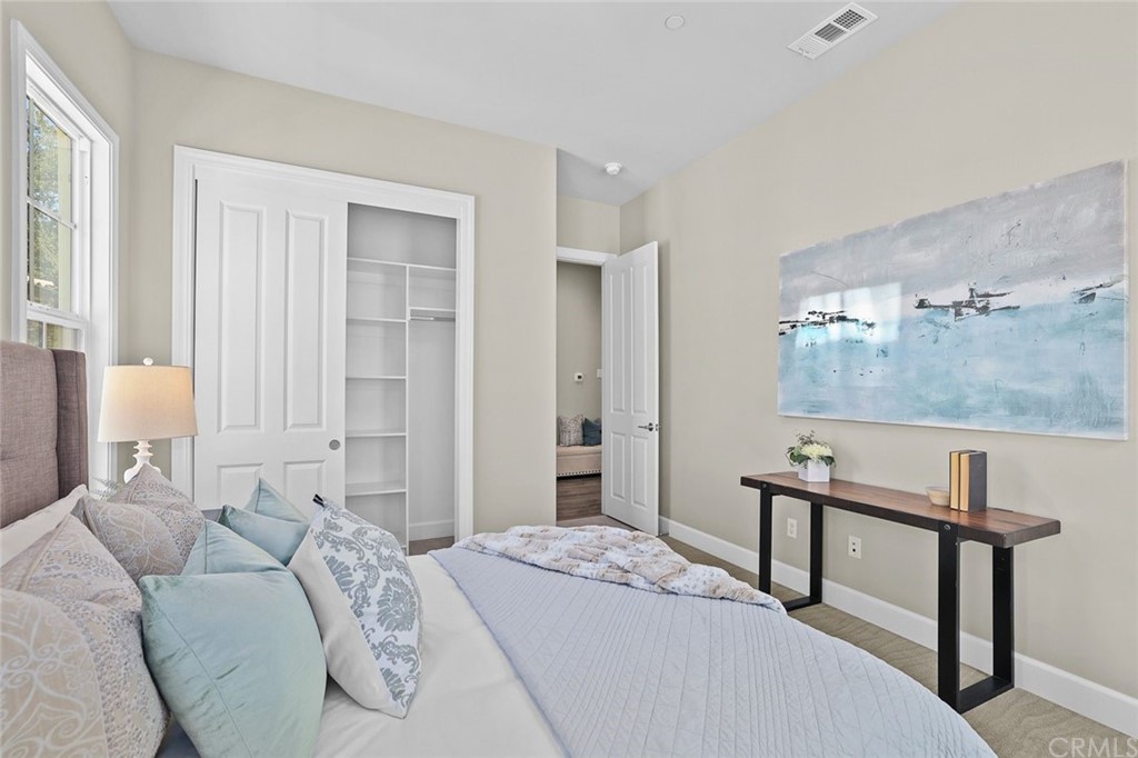 1015 Holly Avenue, Unit B Arcadia, CA 91007 - Photo 28 of 39 a bedroom with a bed and a table