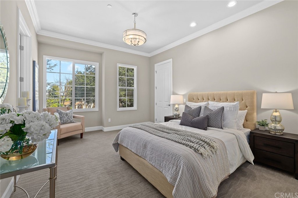 1015 Holly Avenue, Unit B Arcadia, CA 91007 - Photo 30 of 39 a bedroom with bed and large windows