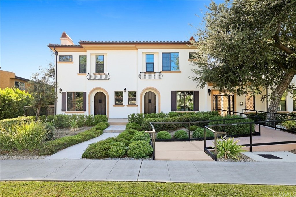 1015 Holly Avenue, Unit B Arcadia, CA 91007 - Photo 4 of 39 a front view of a house with a yard