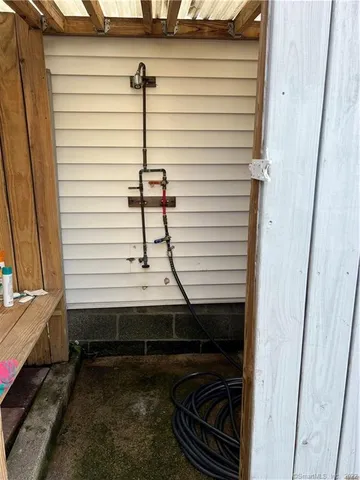 a bathroom view with a sink and a window