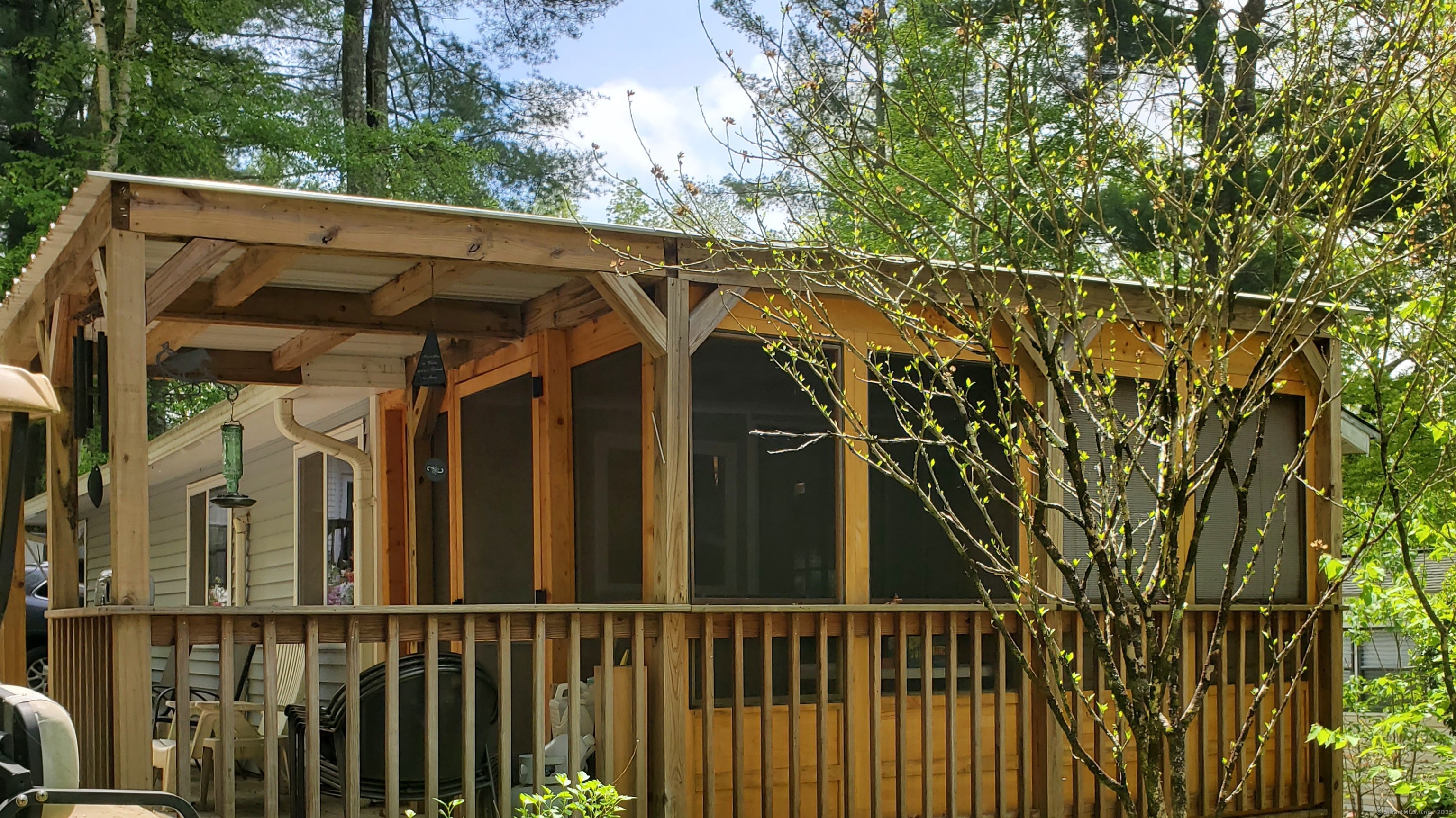 8 S Road, Unit WW4 Stafford, CT 06076 - Photo 4 of 23 a view of a house with a small yard