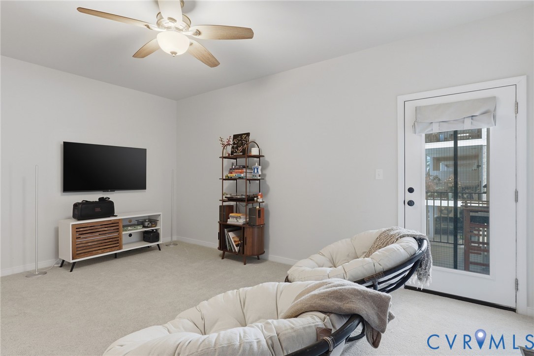 1900 Roseneath Road, Unit 4B Richmond, VA 23230 - Photo 18 of 44 a living room with furniture and a flat screen tv