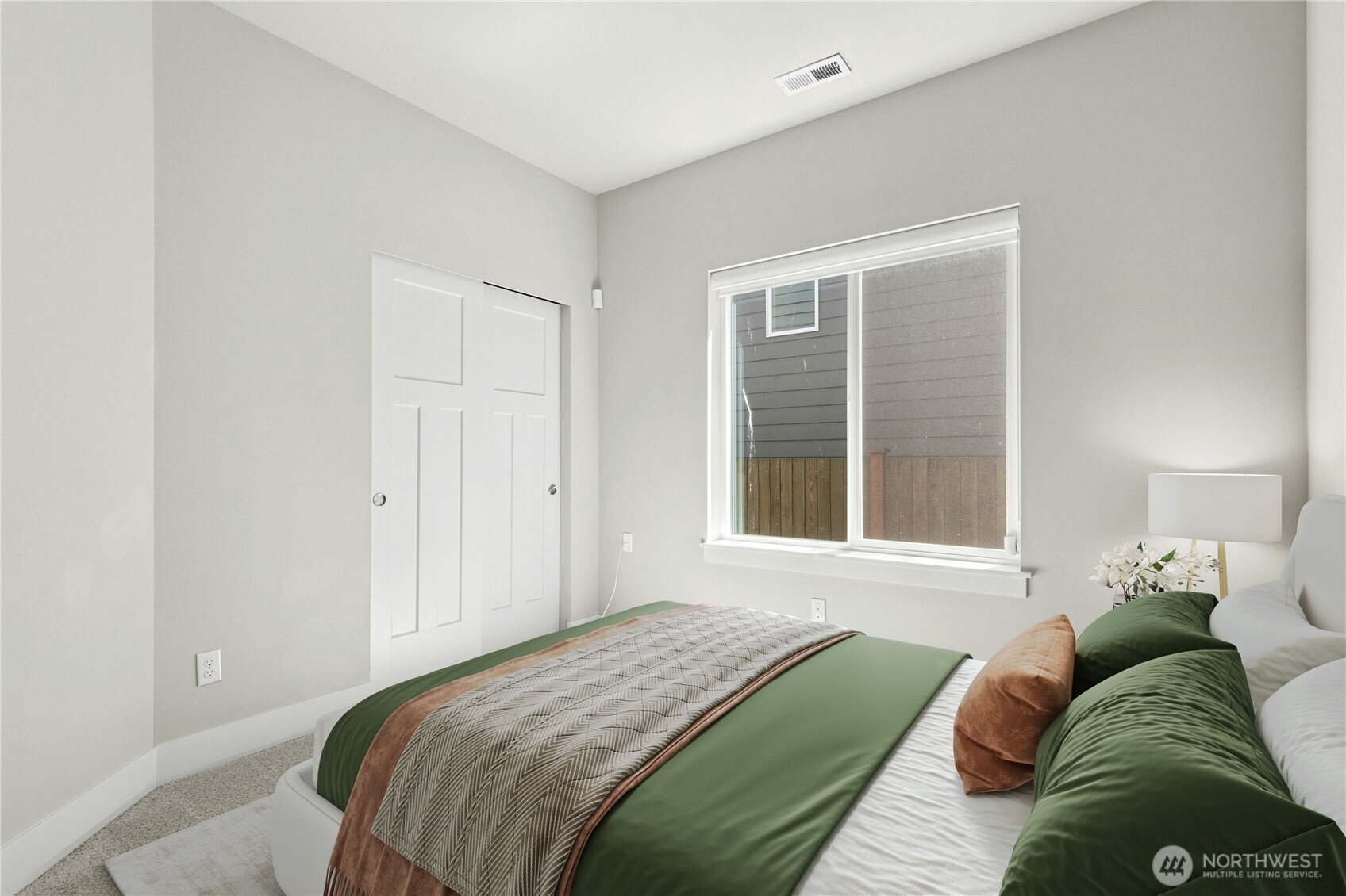 19814 11th Drive Southeast Bothell, WA 98012 - Photo 12 of 32 a bedroom with a bed and a window