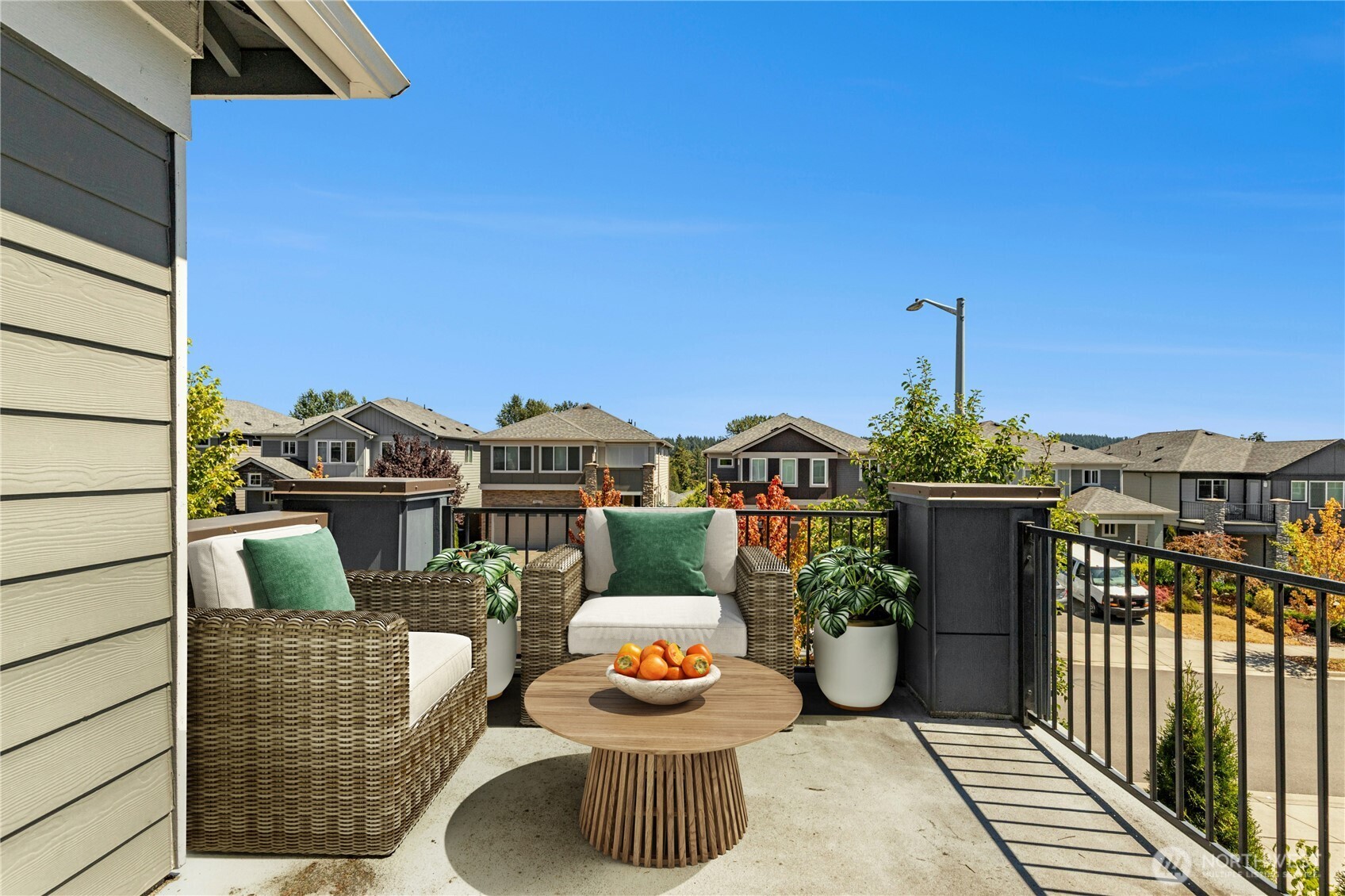 19814 11th Drive Southeast Bothell, WA 98012 - Photo 31 of 32 a balcony with table and chairs