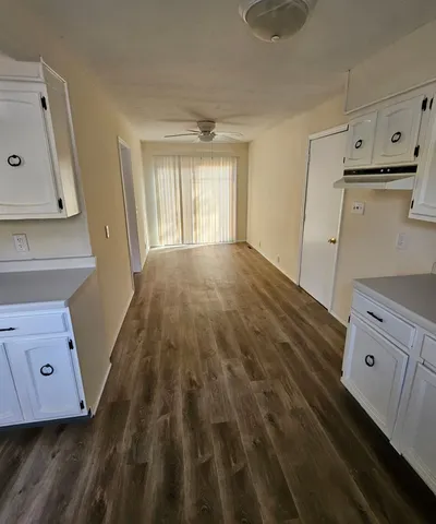 a view of a kitchen from a house