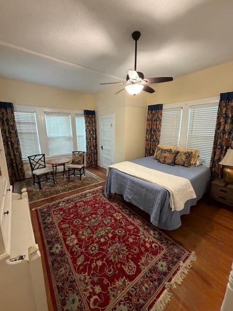 82 Nightingale Street Barnwell, SC 29812 - Photo 5 of 13 a bedroom with a large bed and a chandelier