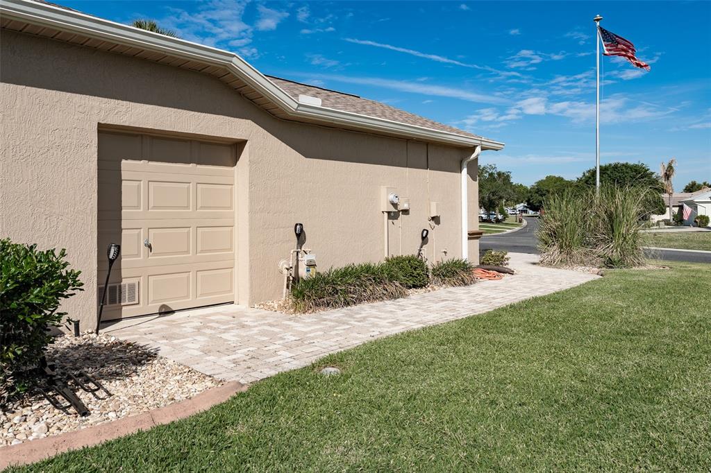15525 Southwest 14th Avenue Road Ocala, FL 34473 - Photo 58 of 75 a front view of a house with a yard