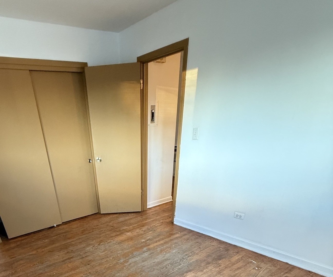 558 North Ardmore Avenue, Unit 2W Villa Park, IL 60181 - Photo 7 of 7 a view of an empty room with wooden floor