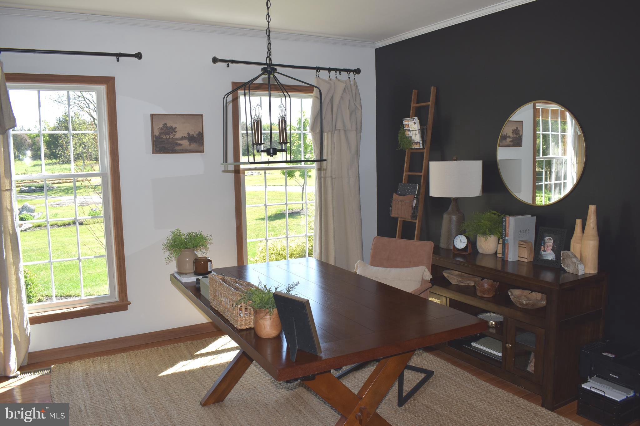 16621 Lappans Road Williamsport, MD 21795 - Photo 35 of 79 a view of a dining room with furniture window and wooden floor
