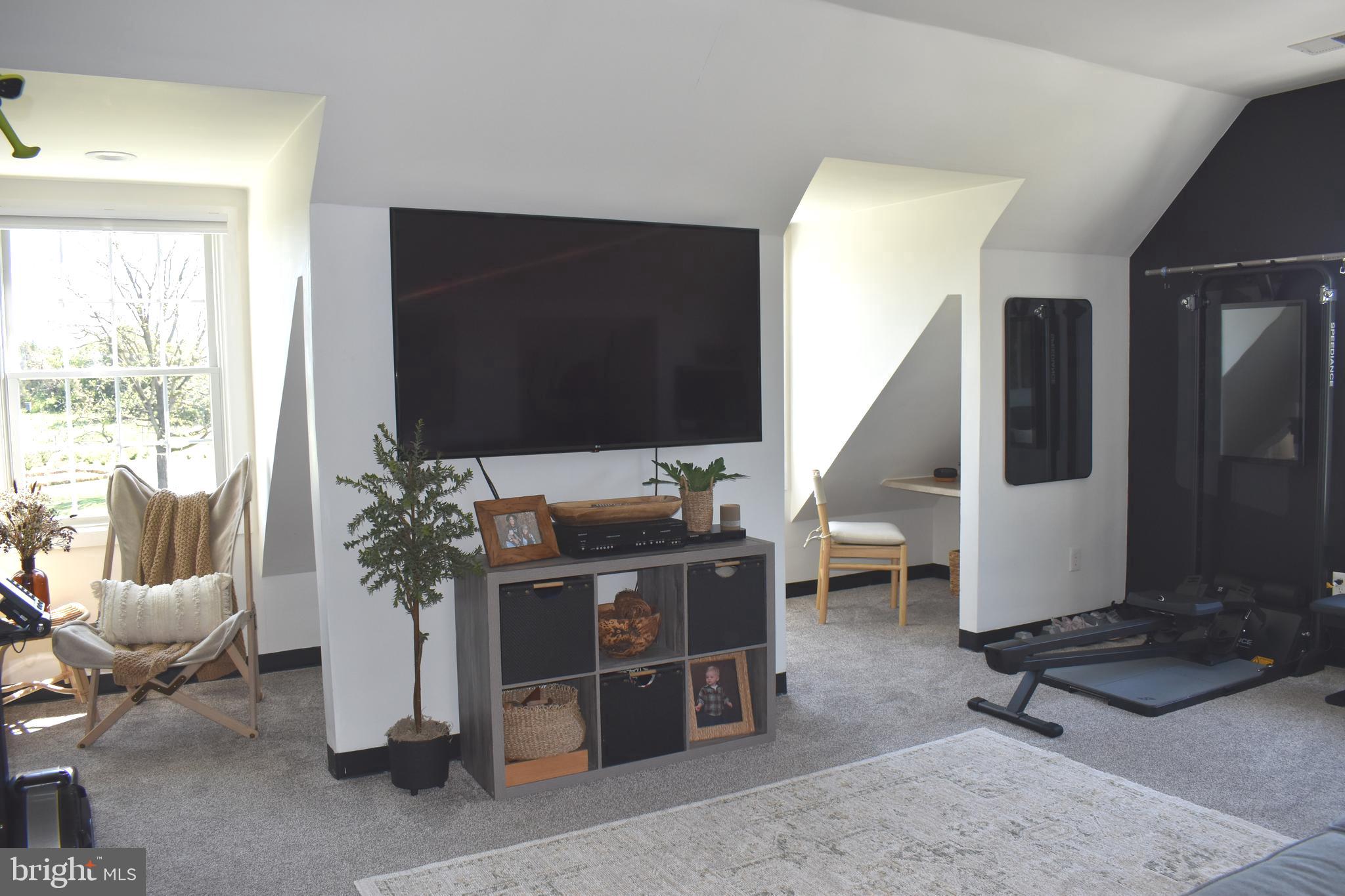 16621 Lappans Road Williamsport, MD 21795 - Photo 48 of 79 a living room with furniture windows and a flat screen tv