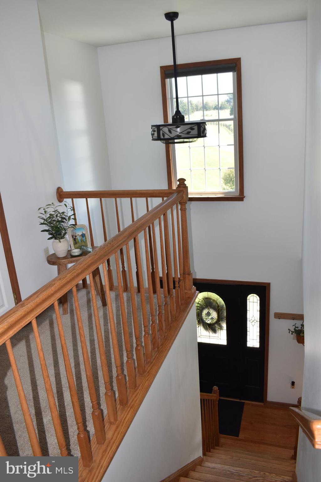 16621 Lappans Road Williamsport, MD 21795 - Photo 50 of 79 a view of a hallway with wooden floor and windows