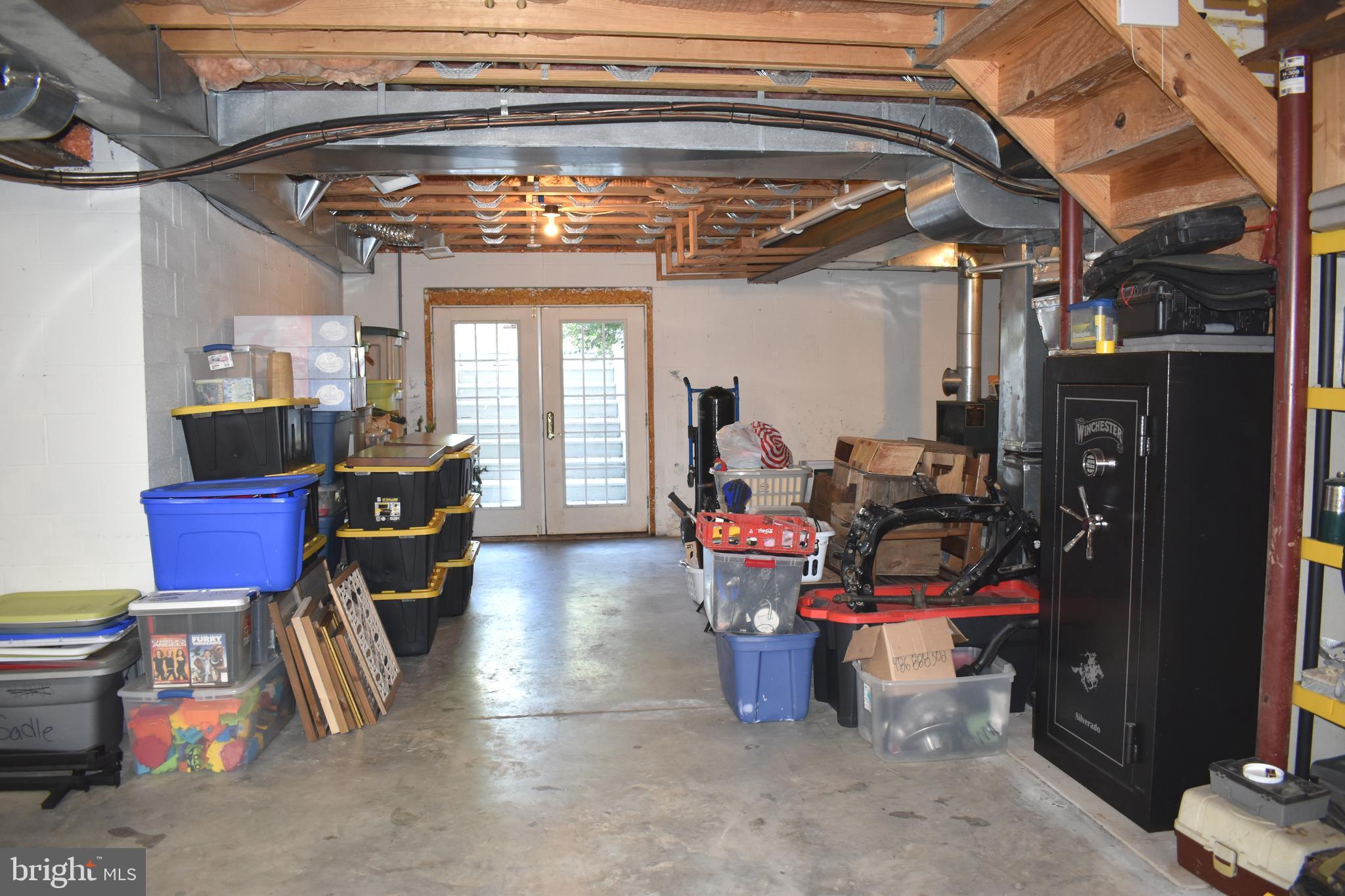 16621 Lappans Road Williamsport, MD 21795 - Photo 56 of 79 a view of a storage room with a lot of stuff
