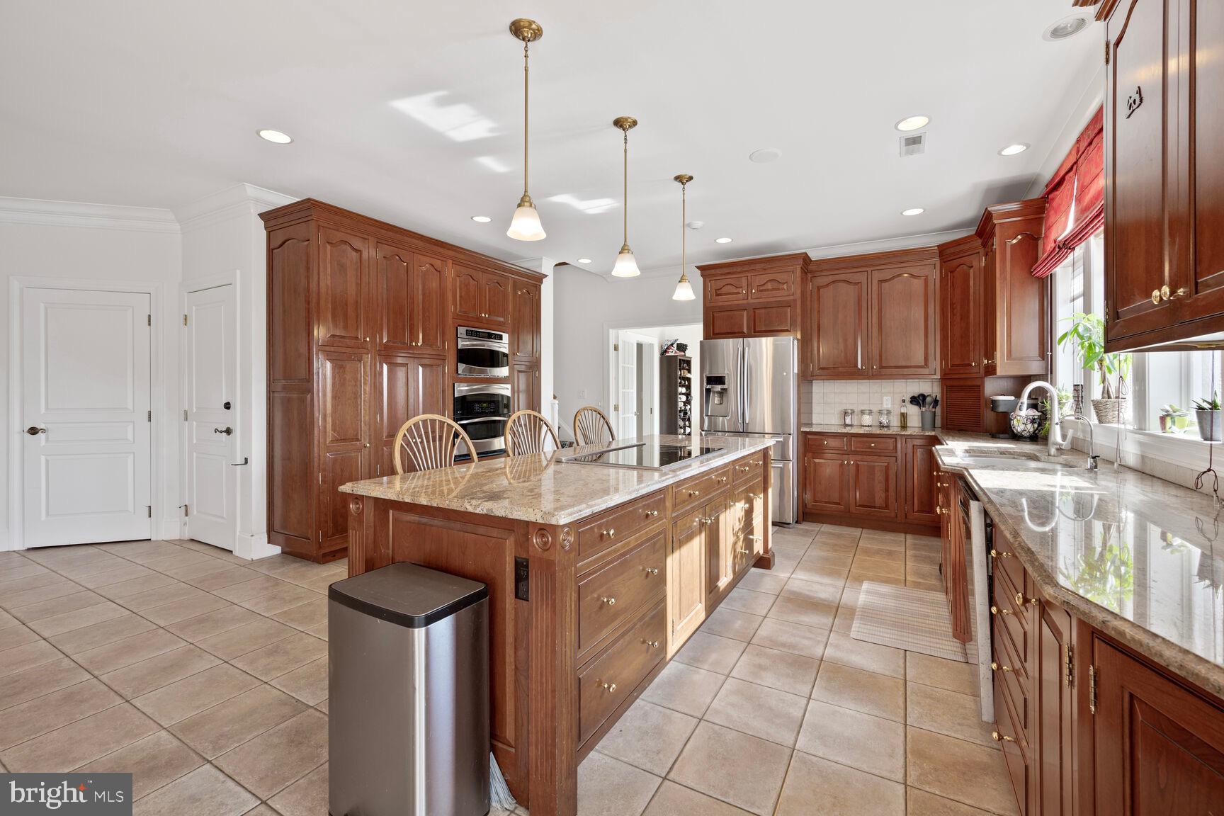 230 Point Airy Road Pilesgrove, NJ 08098 - Photo 27 of 78 a kitchen with stainless steel appliances granite countertop a sink a stove and a refrigerator