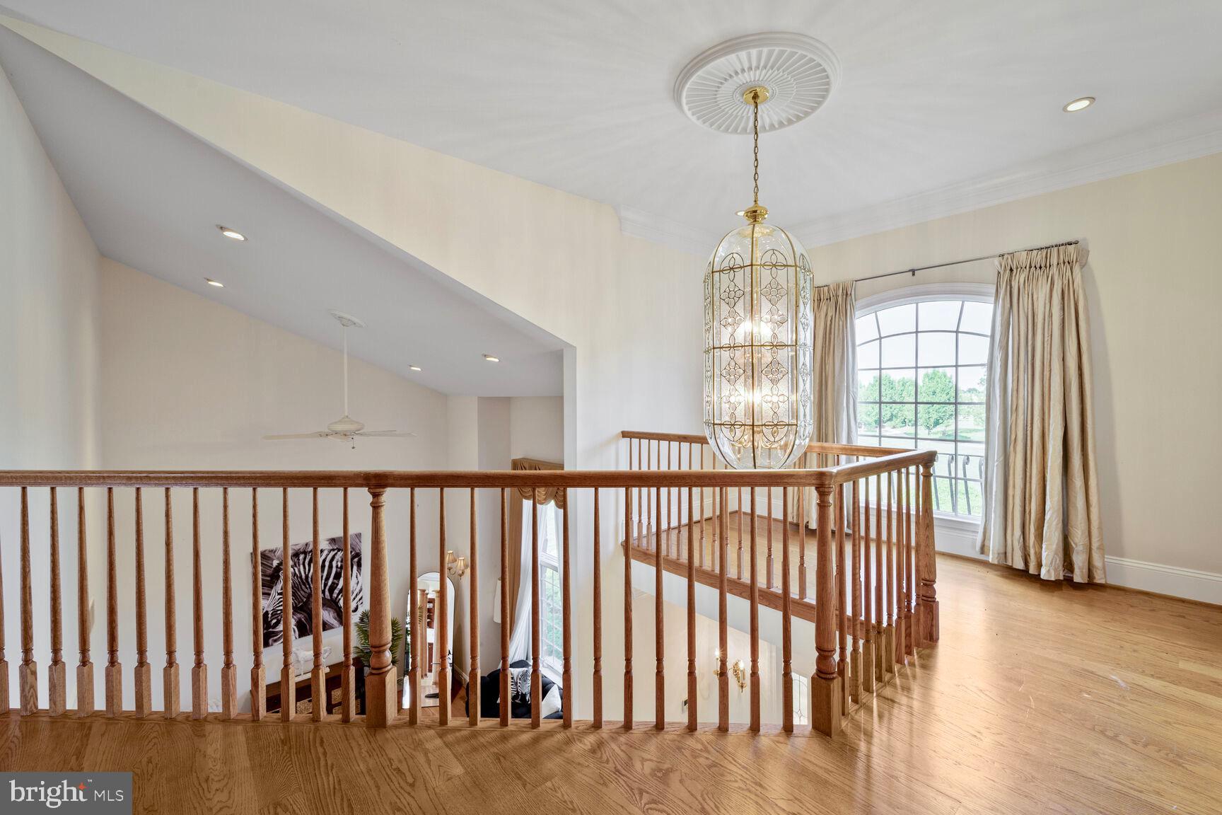 230 Point Airy Road Pilesgrove, NJ 08098 - Photo 35 of 78 a view of hallway with wooden floor and windows