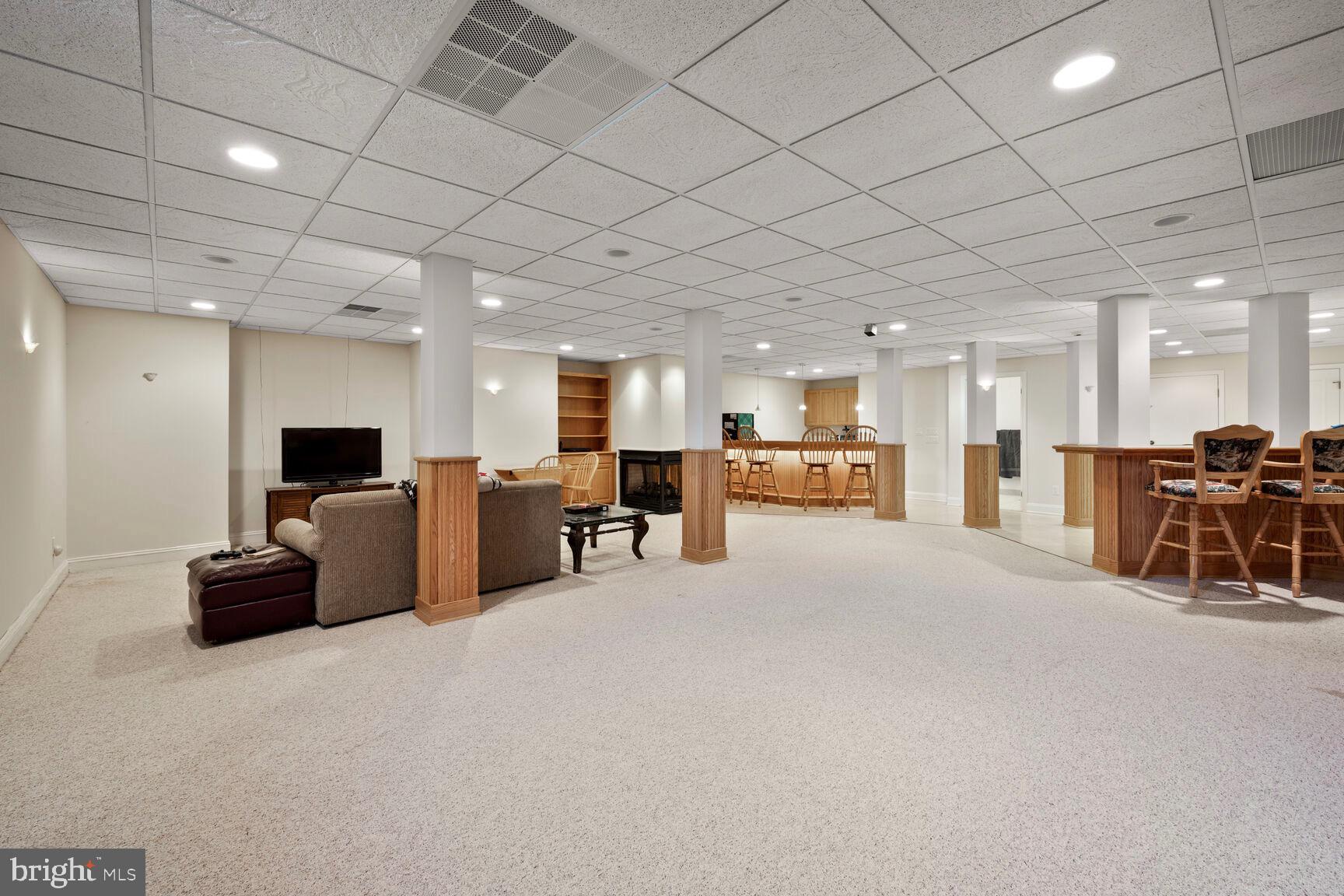 230 Point Airy Road Pilesgrove, NJ 08098 - Photo 46 of 78 a living room with furniture and a flat screen tv