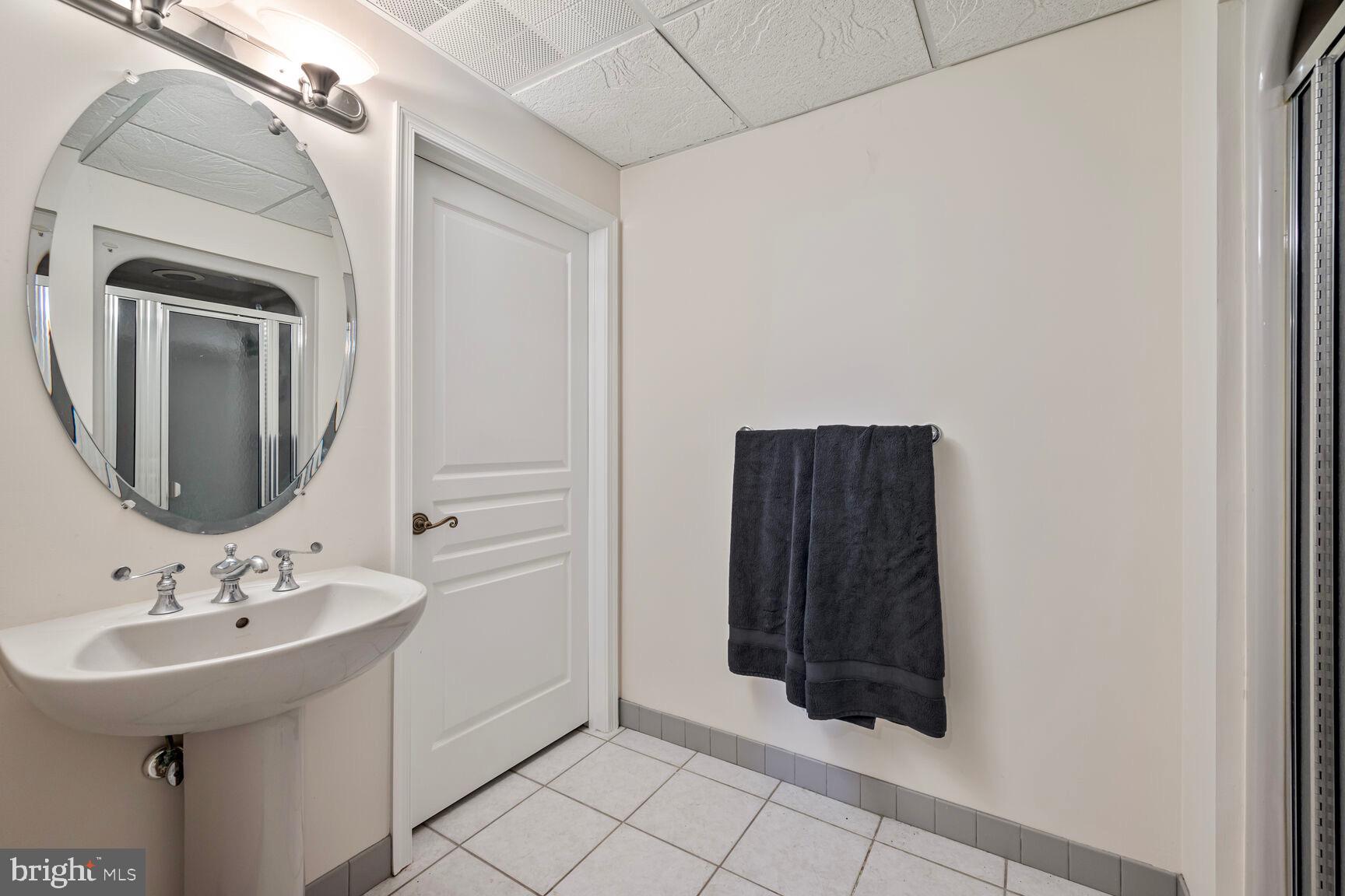 230 Point Airy Road Pilesgrove, NJ 08098 - Photo 54 of 78 a bathroom with a sink and a mirror