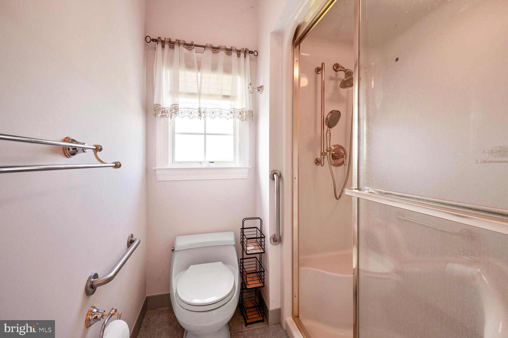 230 Point Airy Road Pilesgrove, NJ 08098 - Photo 58 of 78 a bathroom with a granite countertop toilet a sink and shower