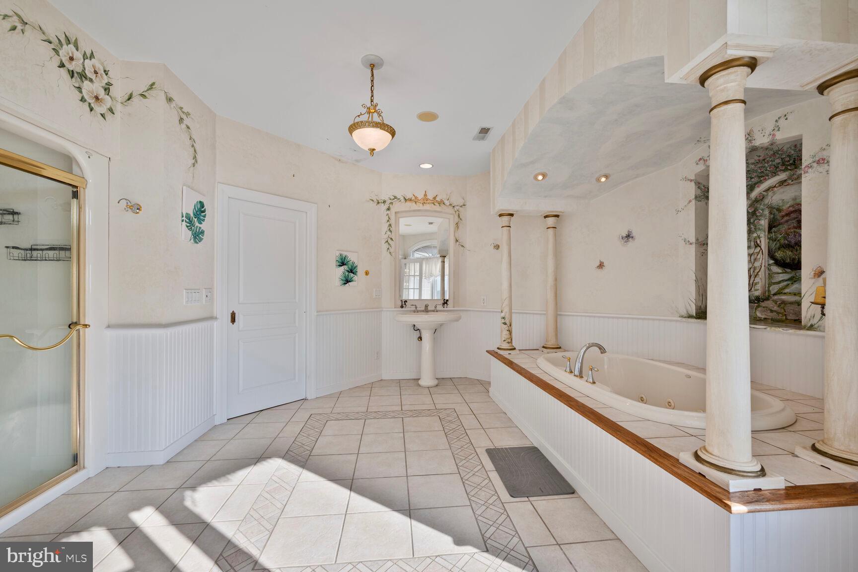 230 Point Airy Road Pilesgrove, NJ 08098 - Photo 60 of 78 a spacious bathroom with a tub sink and mirror