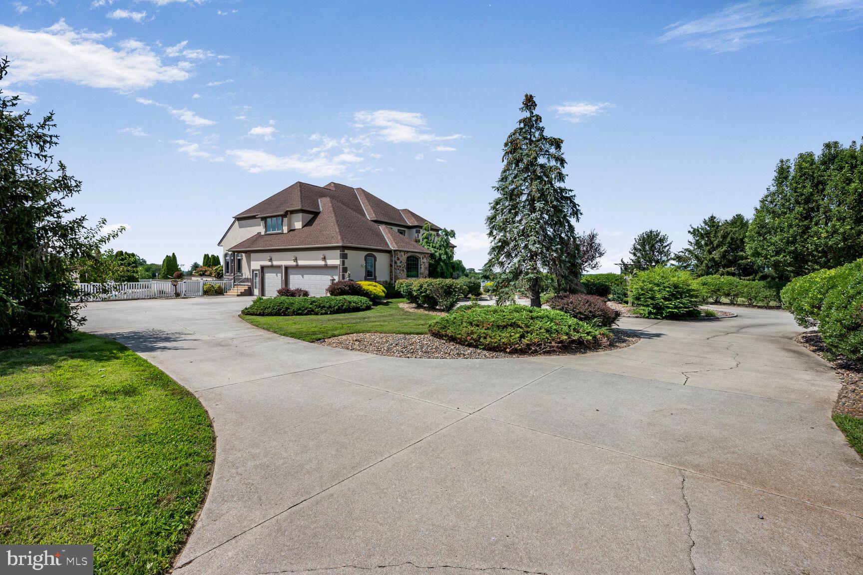 230 Point Airy Road Pilesgrove, NJ 08098 - Photo 64 of 78 a front view of a house with a yard