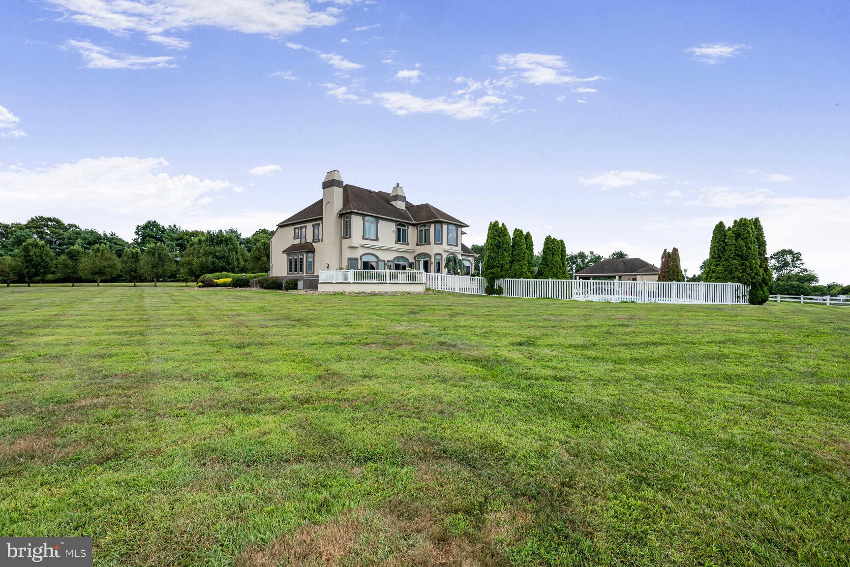 230 Point Airy Road Pilesgrove, NJ 08098 - Photo 78 of 78 a view of a house with a big yard and a large tree