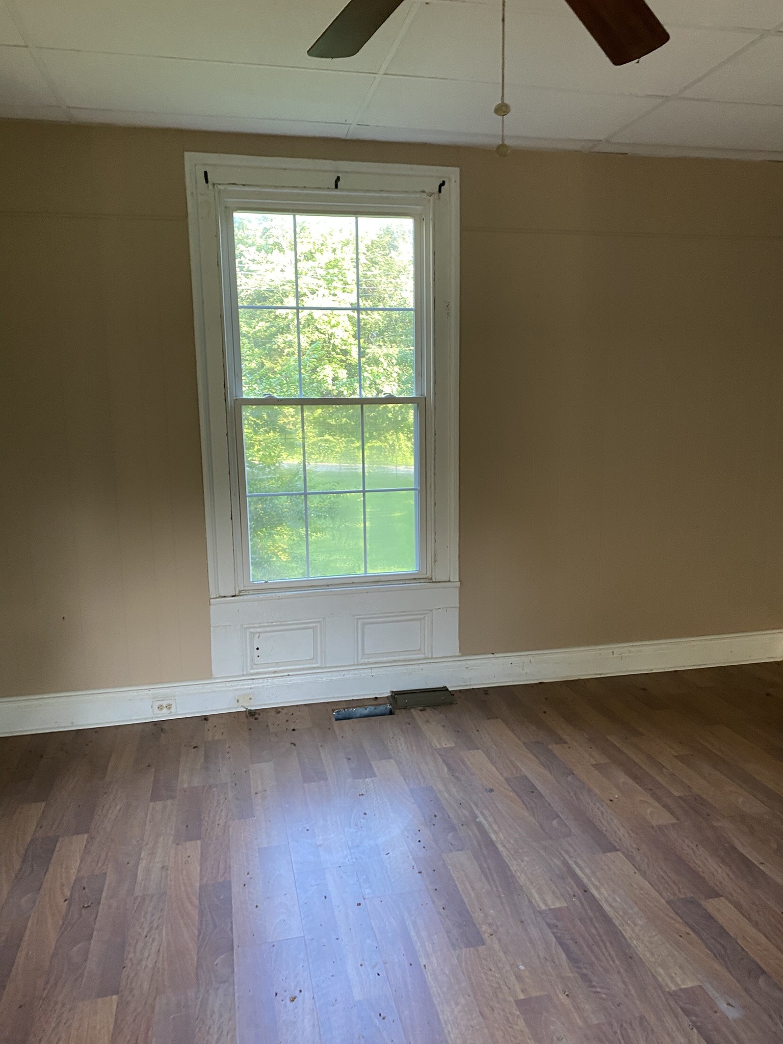 972 Fall River Road Goodspring, TN 38460 - Photo 25 of 31 an empty room with wooden floor and windows
