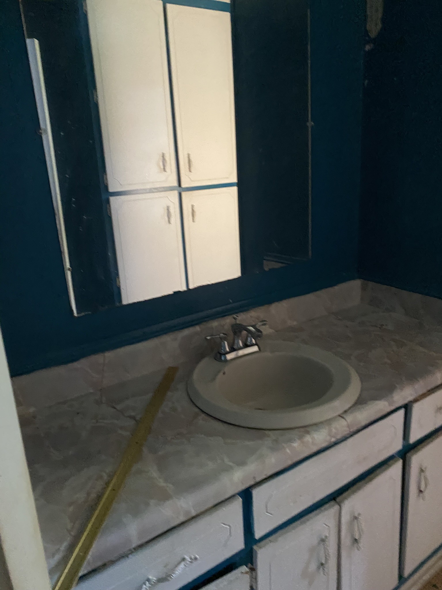 972 Fall River Road Goodspring, TN 38460 - Photo 30 of 31 a bathroom with a sink and a mirror