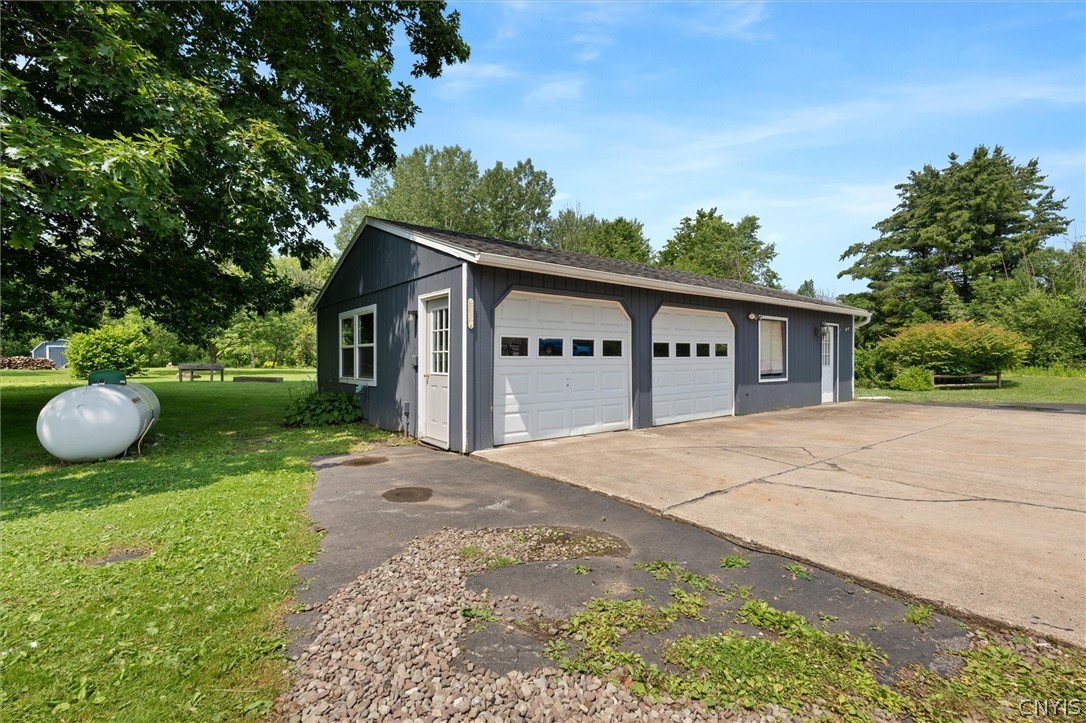 305 Howard Road Volney, NY 13069 - Photo 42 of 49 Front detached garage, party room to the right
