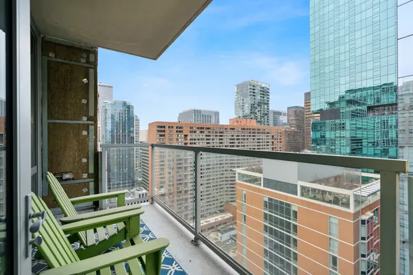 a view of a balcony with city view