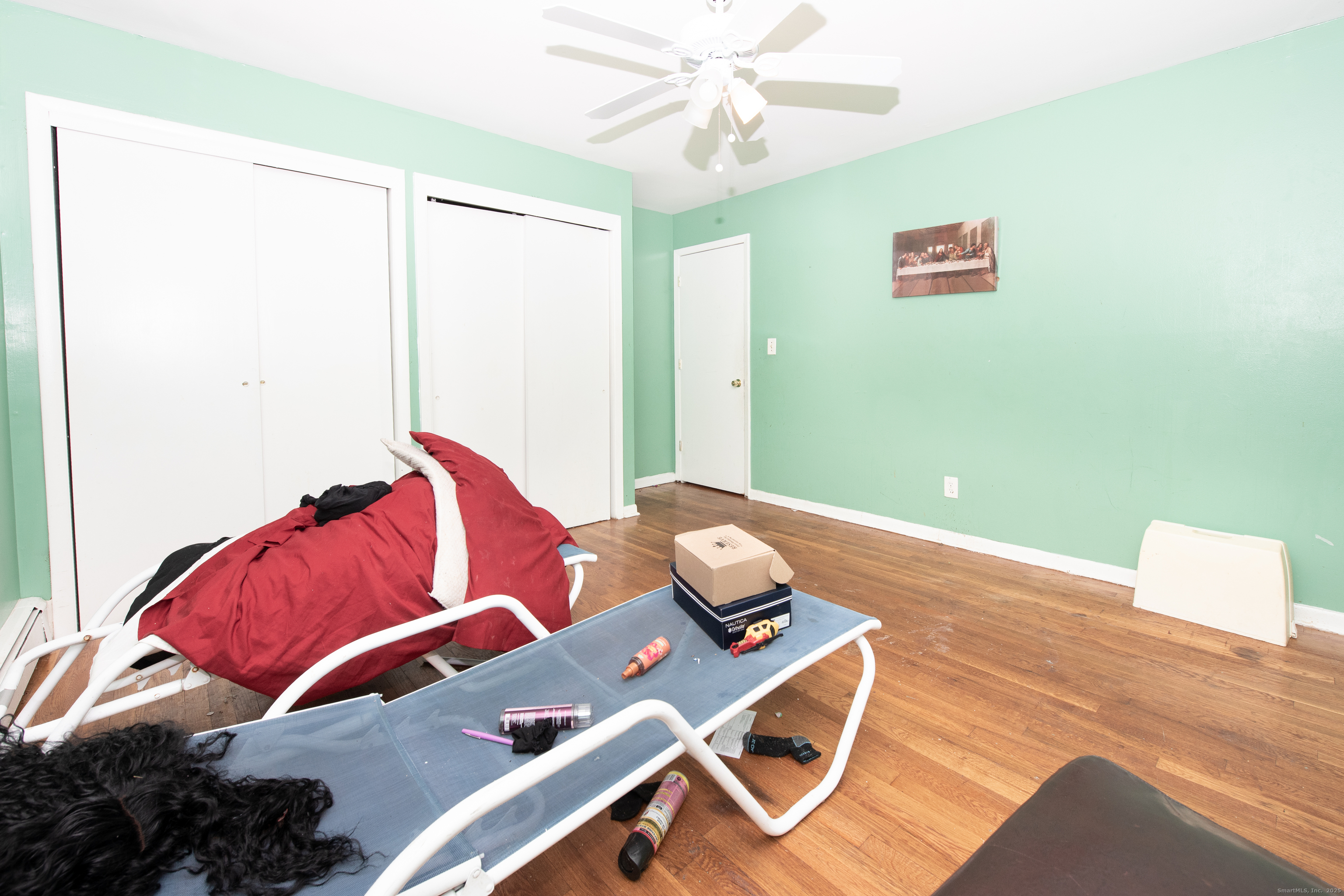 70 Pleasantview Avenue Bridgeport, CT 06606 - Photo 14 of 29 a living room with furniture and a window