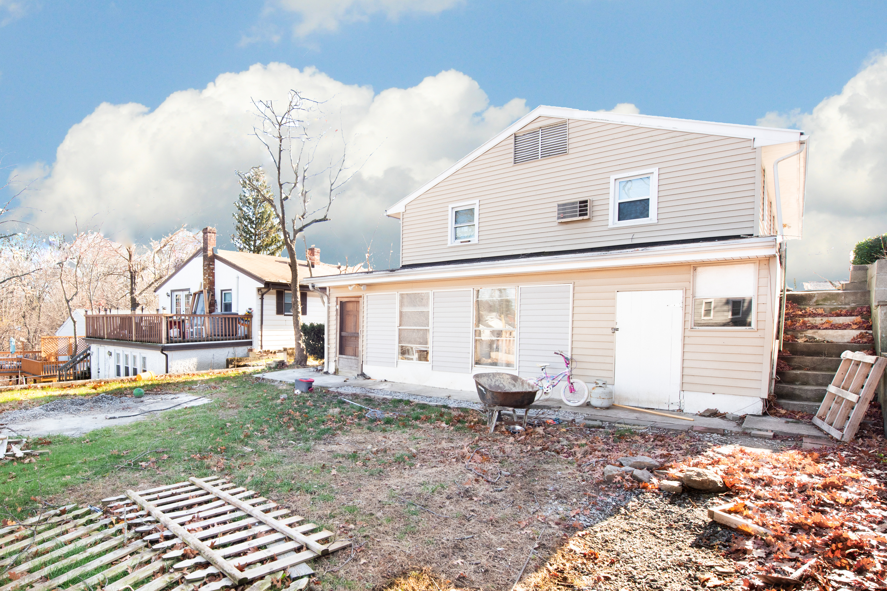 70 Pleasantview Avenue Bridgeport, CT 06606 - Photo 28 of 29 a front view of a house with a yard