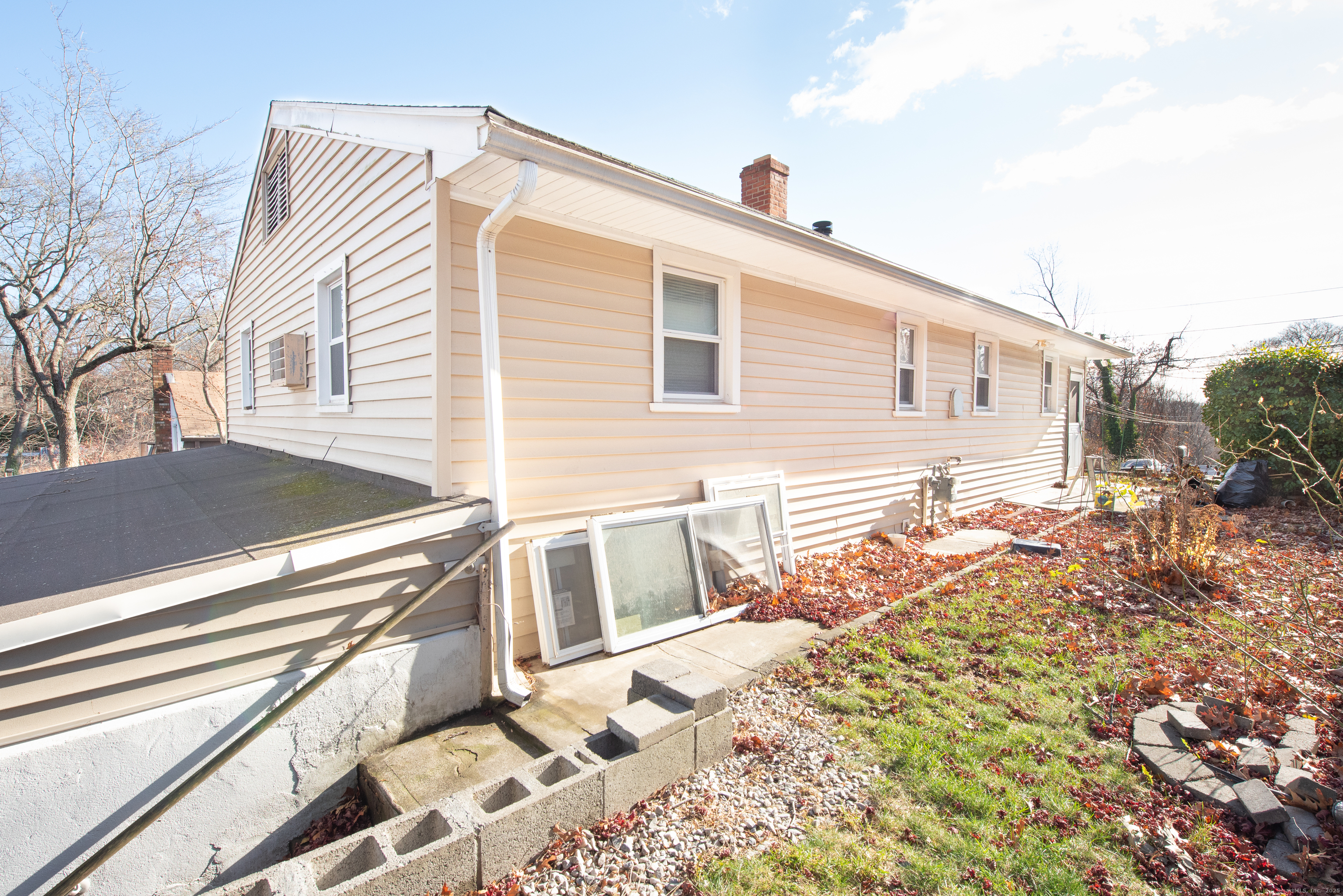 70 Pleasantview Avenue Bridgeport, CT 06606 - Photo 29 of 29 a front view of a house with a yard