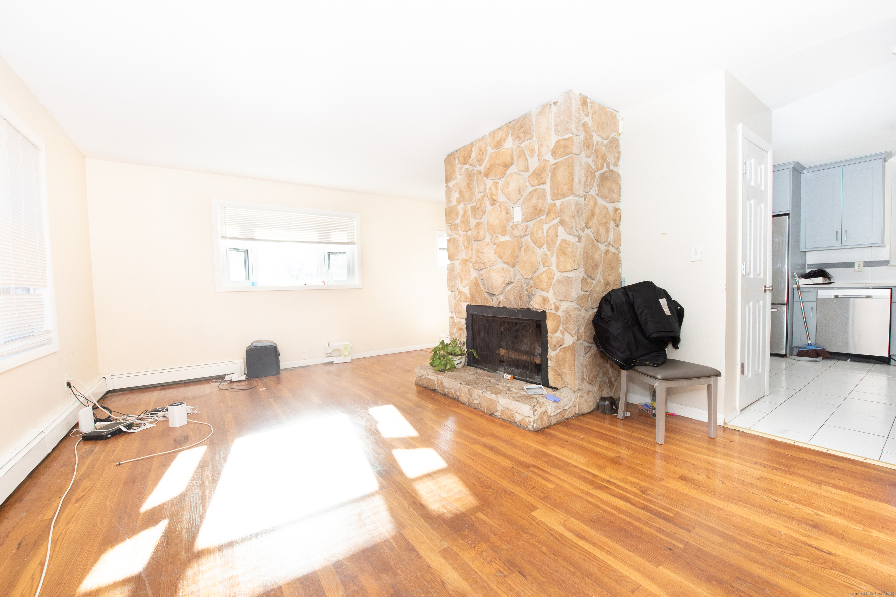 70 Pleasantview Avenue Bridgeport, CT 06606 - Photo 6 of 29 a view of a workspace with furniture and a window