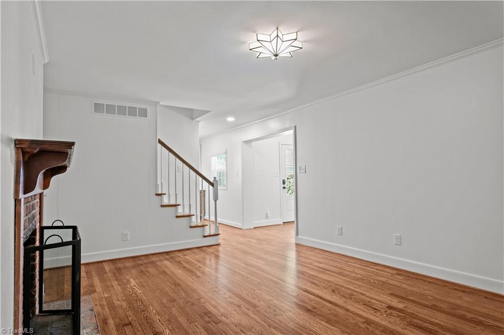 118 East Keeling Road Greensboro, NC 27410 - Photo 15 of 32 Den with one of TWO fully finctional fireplaces.