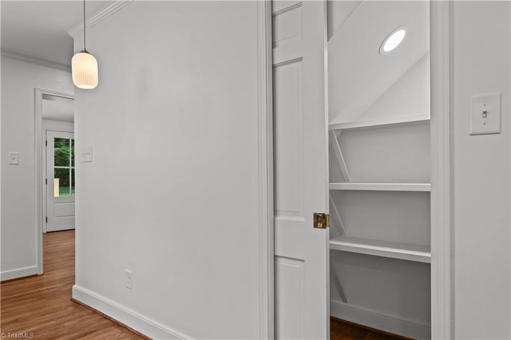 118 East Keeling Road Greensboro, NC 27410 - Photo 9 of 32 Bespoke fixtures, pocket pantry door, and all new electrical.