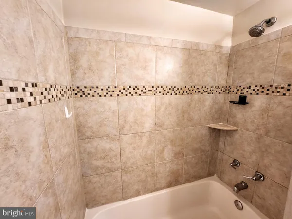 a bathroom with a bathtub