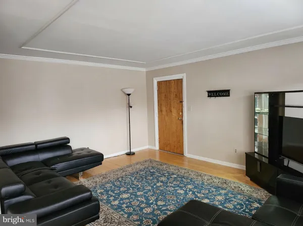 a bedroom with a bed and flat screen tv