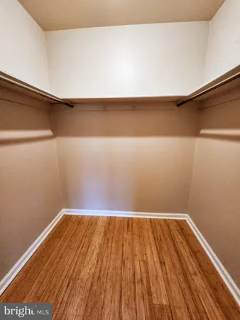 a view of a balcony with chairs