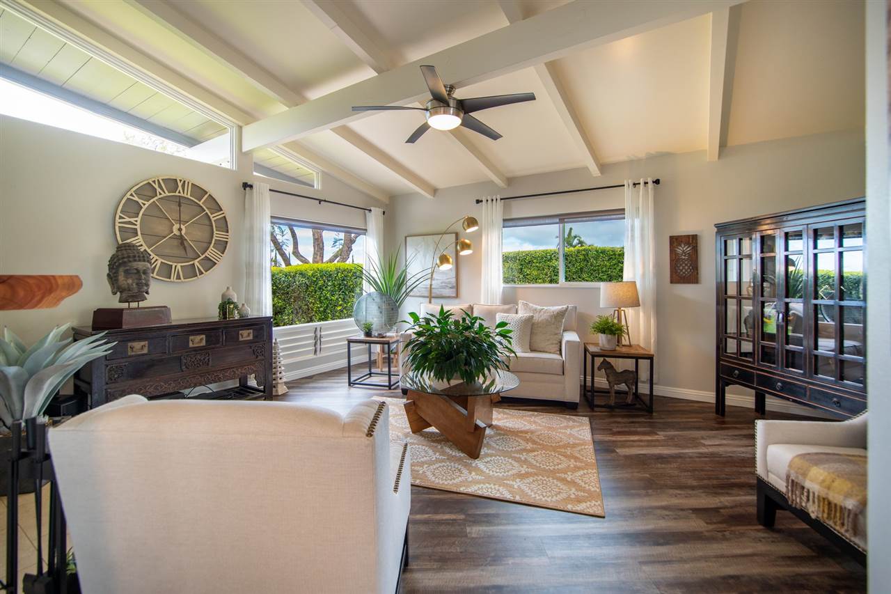 78 Ka Drive, Unit 1 Kula, HI 96790 - Photo 2 of 28 a living room with furniture and a large window