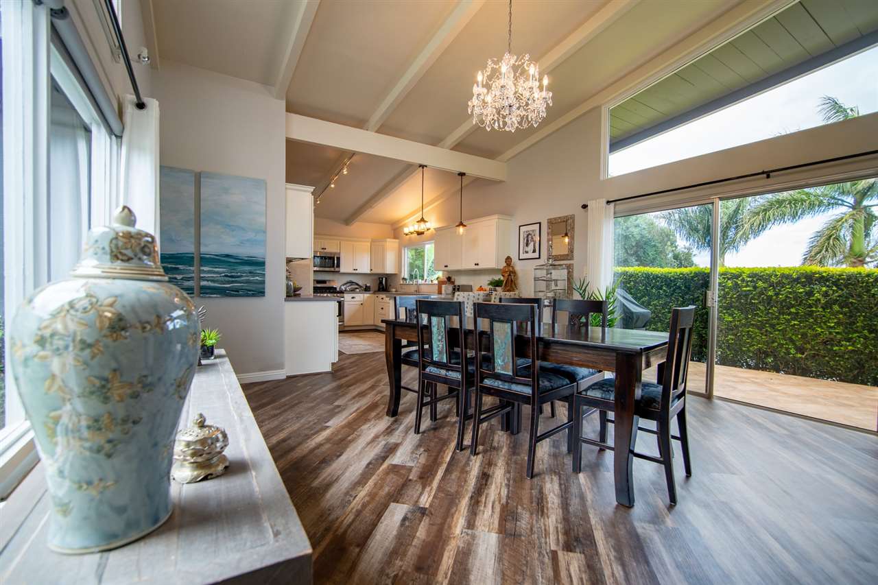78 Ka Drive, Unit 1 Kula, HI 96790 - Photo 7 of 28 a view of a dining room with furniture window and wooden floor