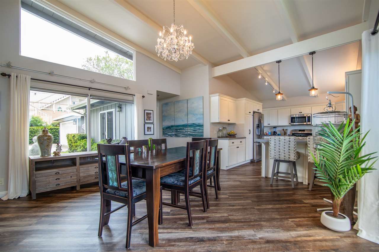78 Ka Drive, Unit 1 Kula, HI 96790 - Photo 9 of 28 a view of a dining room with furniture window and wooden floor