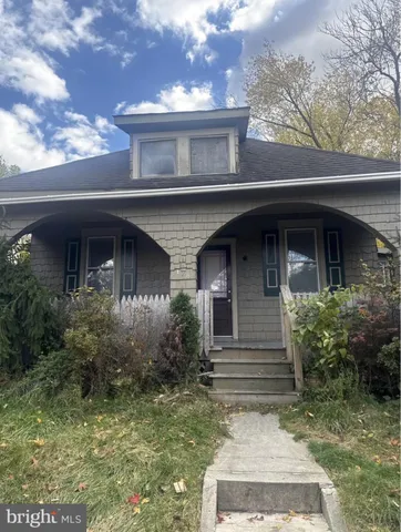 a view of house with outdoor space
