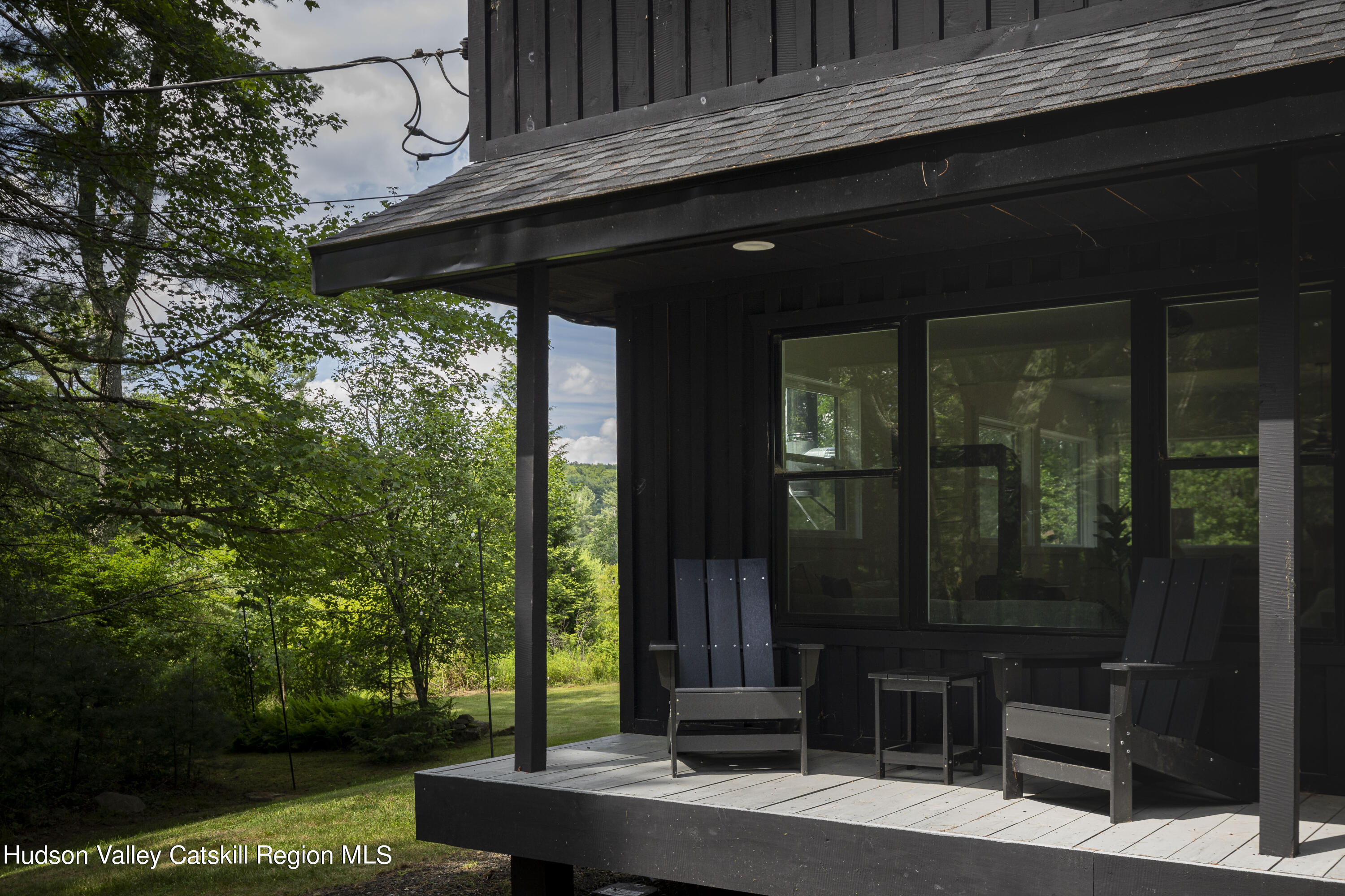 5646 Red Hill Road Claryville, NY 12725 - Photo 11 of 30 a black and white outdoor sitting on a table