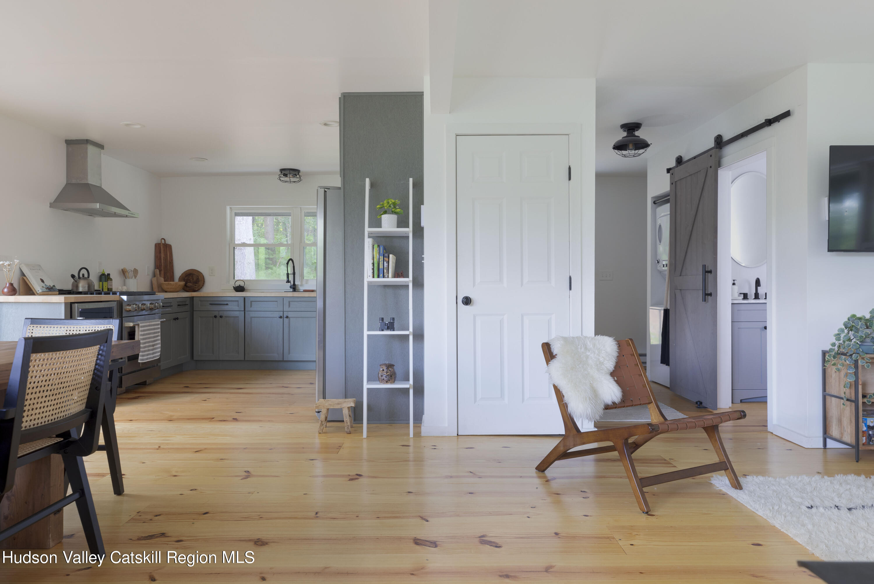 5646 Red Hill Road Claryville, NY 12725 - Photo 15 of 30 a view of a dining room with furniture and a livingroom