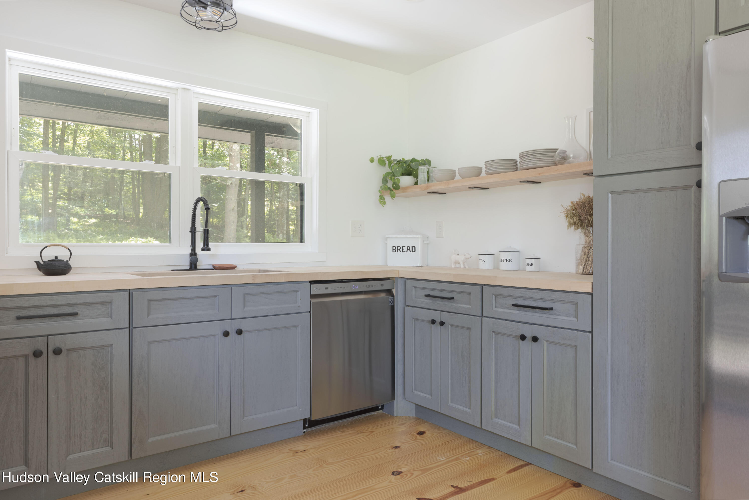 5646 Red Hill Road Claryville, NY 12725 - Photo 18 of 30 a spacious bathroom with a sink and mirror